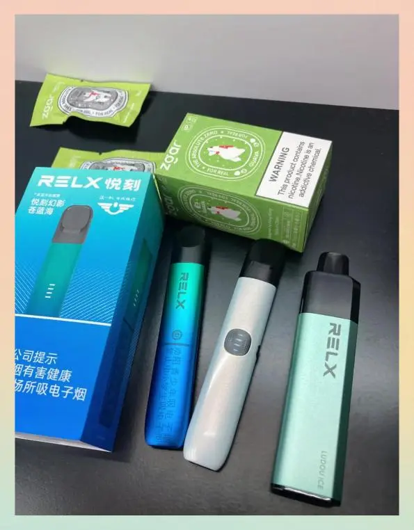 A RELX retail box with three devices and sealed pouches of replacement pods